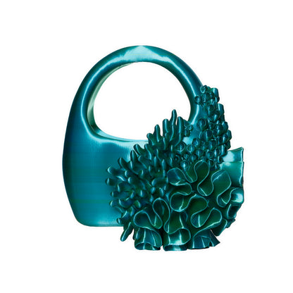 Back view of the Siren Bag in Satin Multitone Blue/Green, highlighting its bold, sculptural design, a key piece from Bhumi's "Bathe in the Waters" debut collection.